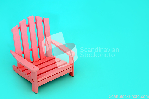 Image of Minimal Colour Contrast with Solitary Pink Trendy Chair  