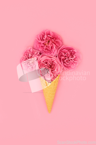 Image of Surreal Ice Cream Cone with Red Summer Rose Flowers