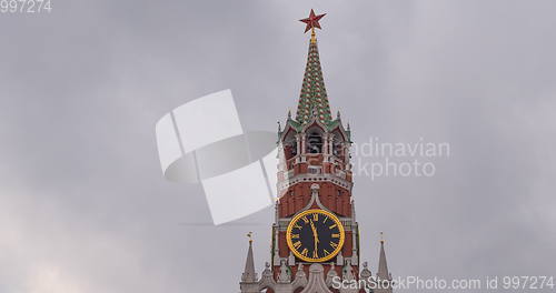 Image of Moscow Kremlin Main Clock named Kuranti on Spasskaya Tower 12 hours . Red Square.