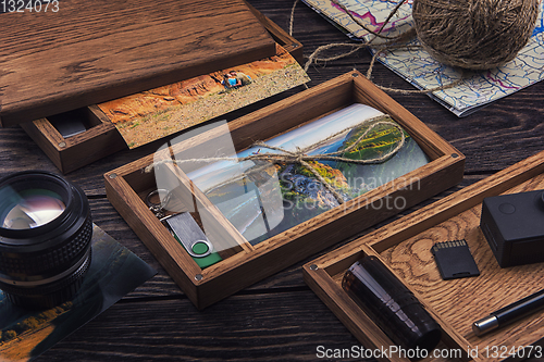 Image of Wooden photo box with photo from travel