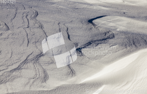 Image of Deep snowdrifts - deep snowdrifts photographed close-up in sunny weather. Winter season