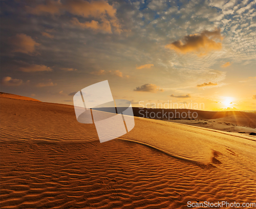 Image of White sand dunes on sunrise, Mui Ne, Vietnam