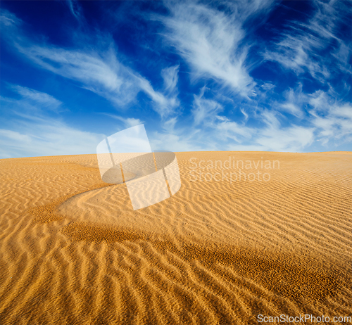 Image of Desert sand dunes on sunrise