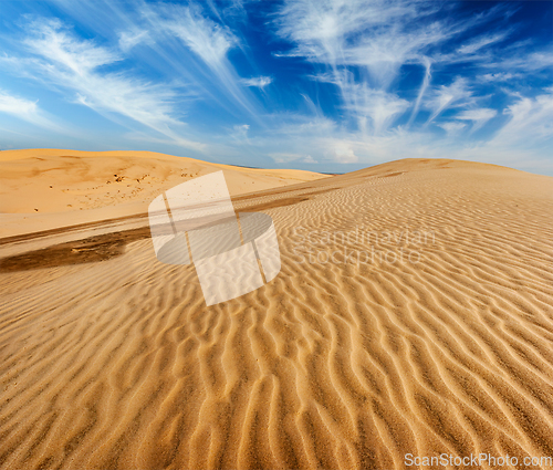 Image of Desert sand dunes on sunrise