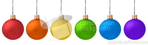 Image of Several hanging Christmas baubles isolated