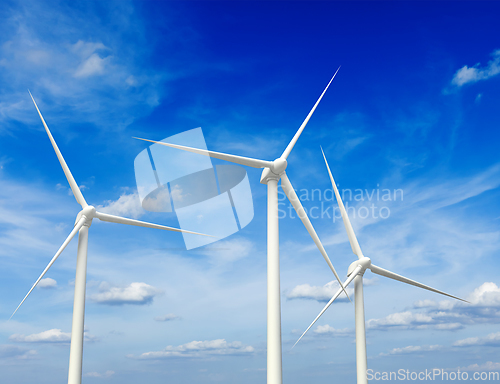 Image of Wind generator turbines in sky