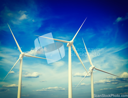 Image of Wind generator turbines in sky