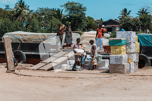 Image of Malagasy workers on main street of Maroantsetra, Madagascar