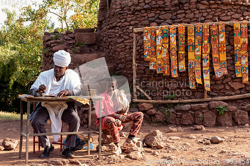Image of Ethiopian man paints religious motifs, Lalibela Ethiopia