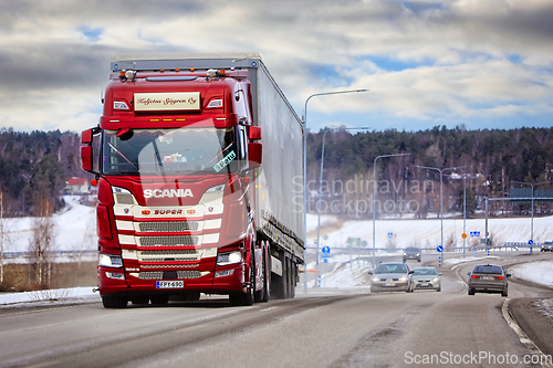 Image of Red Scania 500 S Super Truck Pulls Semi Trailer on Road
