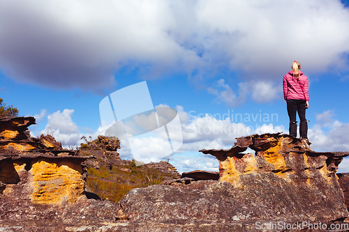 Image of Woman on a pagoda rock Blue Mountains Australia