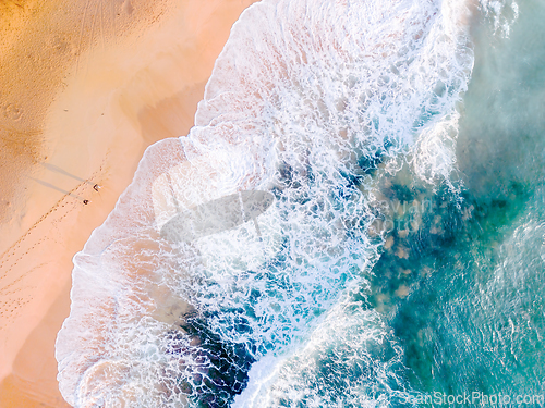 Image of Aerial pastel  of  ocean waves on beach seascape scene