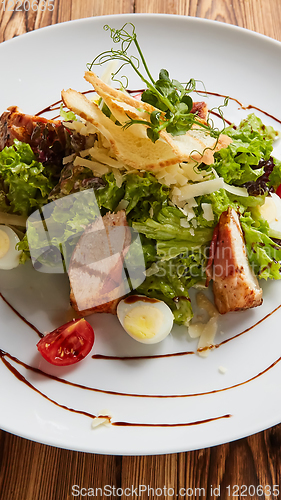 Image of Chicken Salad. Chicken Caesar Salad. Caesar Salad with grilled c