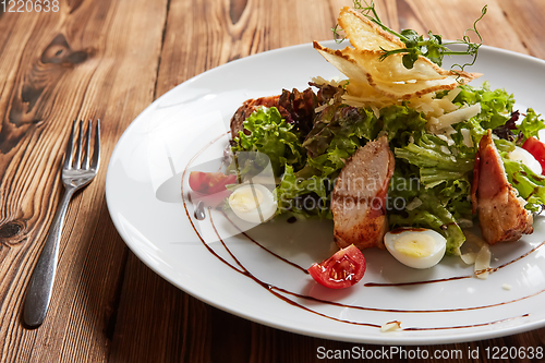 Image of Chicken Salad. Chicken Caesar Salad. Caesar Salad with grilled c