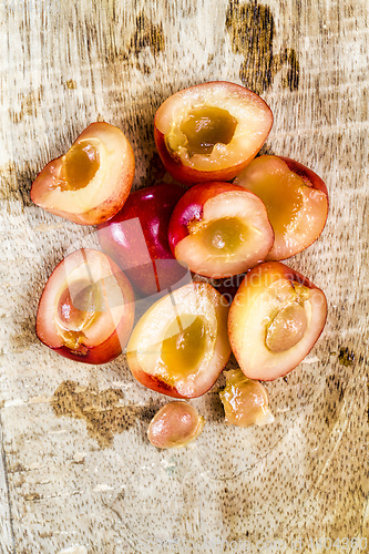 Image of sliced yellow cherries