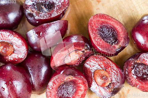 Image of sliced red sweet cherries