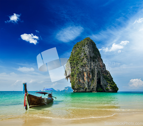 Image of Long tail boat on beach, Thailand