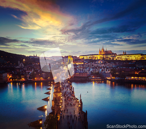 Image of Night view of Prague castle and Charles Bridge over Vltava