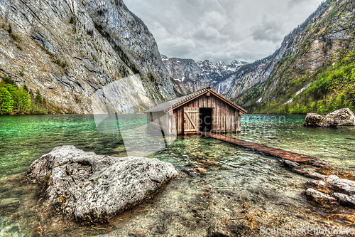 Image of Boat dock hangar on Obersee mountain lake in Alps