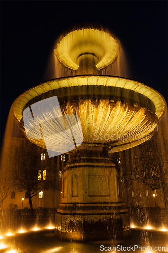 Image of Fountain in the Geschwister-Scholl-Platz in the evening. Munich,