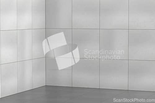 Image of Empty room with grey ceramic tiles