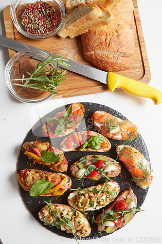 Image of Set of assorted bruschetta with various toppings for holiday. To
