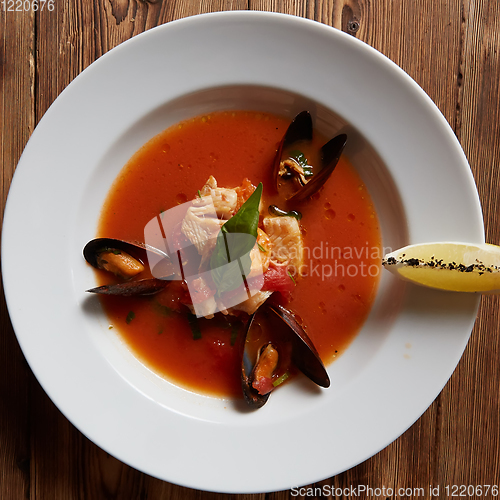 Image of Close up of a bowl of italian seafood soup