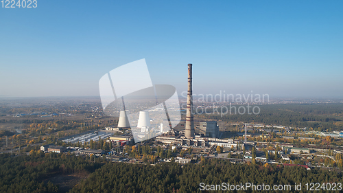 Image of The thermoelectric plant with big chimneys in forest