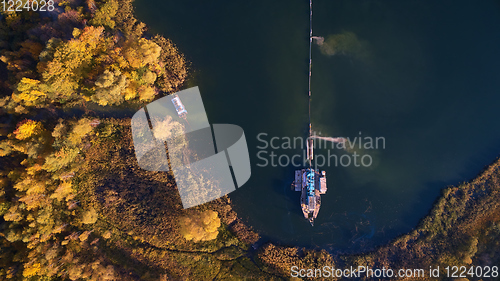 Image of On the river there are works on extraction of sand. Works dredge