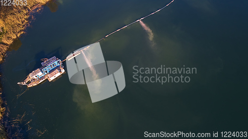 Image of On the river there are works on extraction of sand. Works dredge