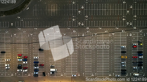 Image of Aerial top view of parking lot with many cars from above, transportation and urban concept.