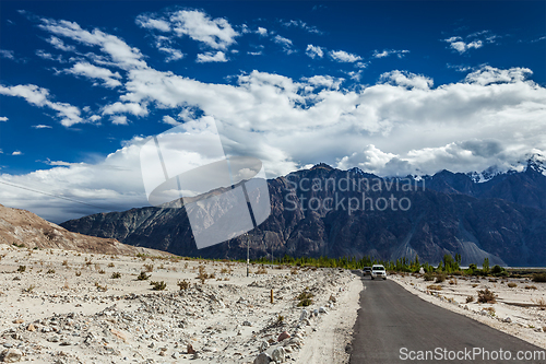 Image of Road in Himalayas with cars