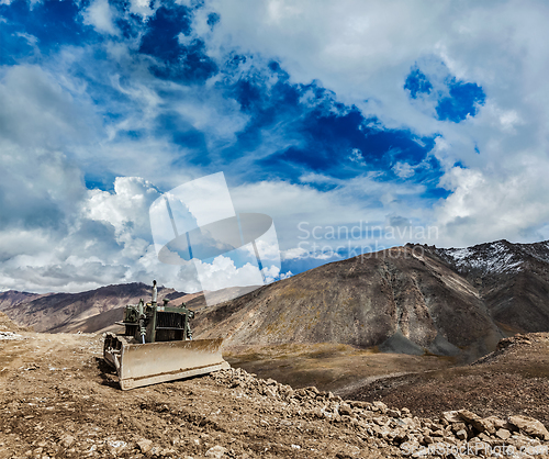 Image of Bulldozer on road in Himalayas