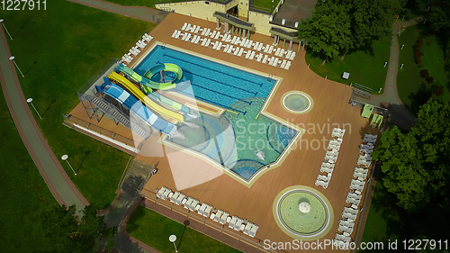 Image of swimming pool on luxury resort in forest.