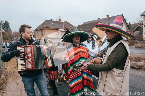 Image of People attend the Slavic Carnival Masopust