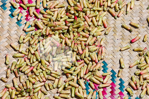 Image of drying flower buds from clove spice