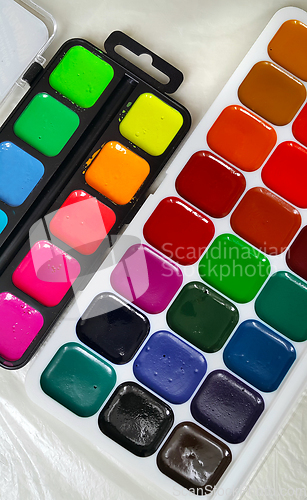 Image of Bright colorful watercolor paints 
