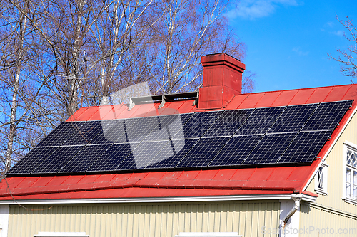 Image of House with Rooftop Solar Panels