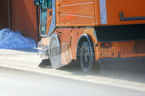 Image of Street Sweeper Machine Cleans the Pavement