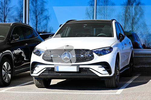 Image of White Luxury Mercedes-Benz SUV Car Parked