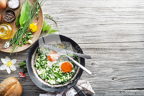 Image of Fried eggs herbs