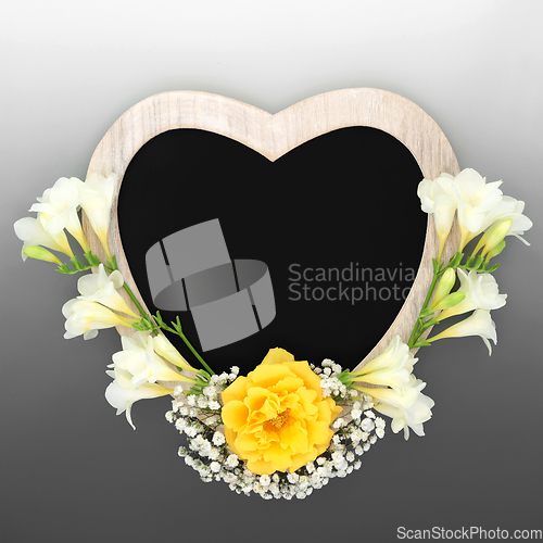 Image of In Memorium Heart Shaped Frame and Flower Composition