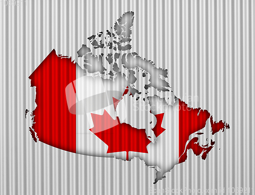 Image of Map and flag of Canada on corrugated iron