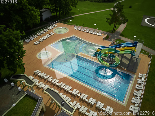 Image of swimming pool on luxury resort in forest.