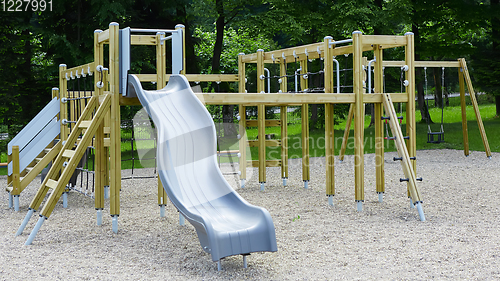 Image of Colorful playground on yard in the park.