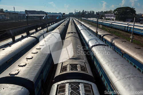 Image of Trains at train station. Trivandrum, Kerala, India