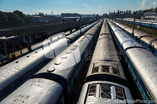 Image of Trains at train station. Trivandrum, Kerala, India