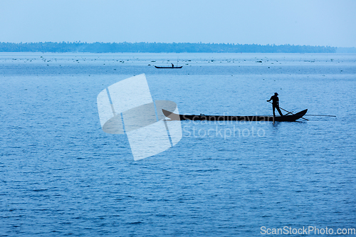 Image of Man on boat. Kerala, India