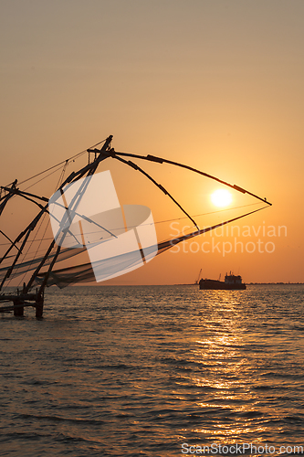 Image of Chinese fishnets on sunset. Kochi, Kerala, India