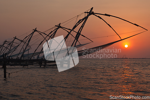 Image of Chinese fishnets on sunset. Kochi, Kerala, India